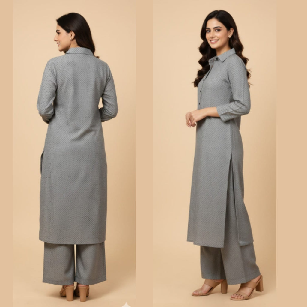 Woman wearing a gray kurta with wide-leg pants on a beige background