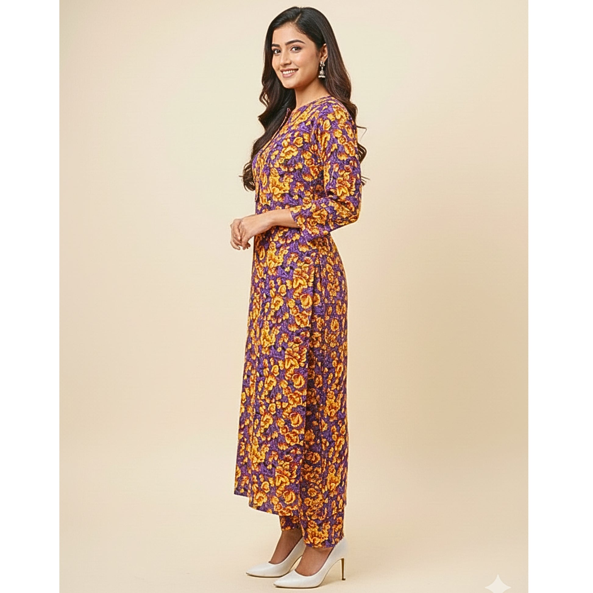Woman wearing a floral dress on a beige background