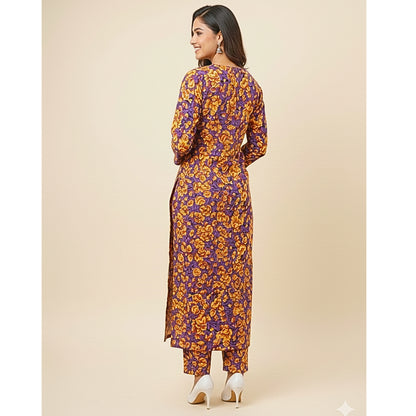 Woman wearing a floral dress on a beige background