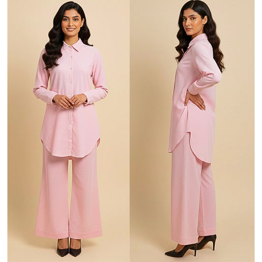 Woman wearing a pink outfit on a beige background