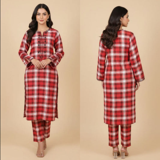 Red and white checkered outfit worn by a model on a beige background