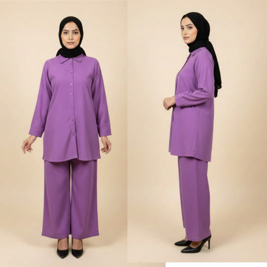 Woman wearing a purple outfit with a hijab on a beige background