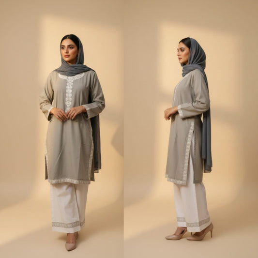 Woman wearing a light gray traditional outfit with white pants on a beige background