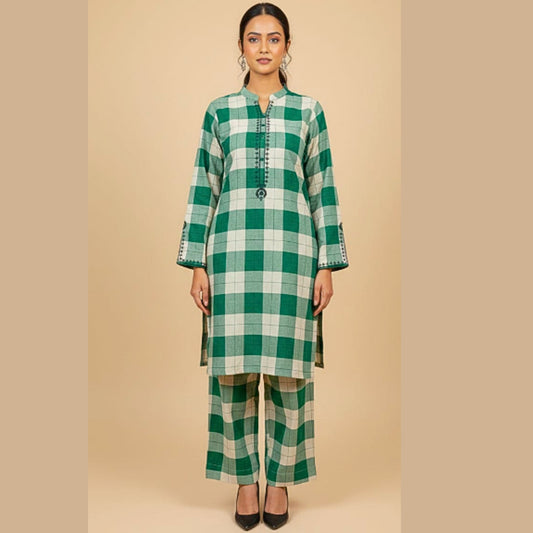 Woman wearing a green and white checkered outfit on a beige background